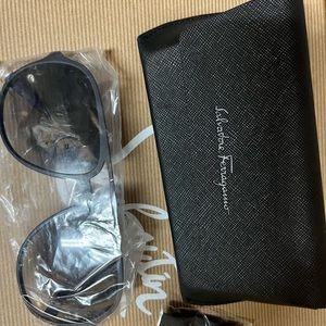 Selling women's Valentino brand glasses
ferragamo men's glasses
card holder